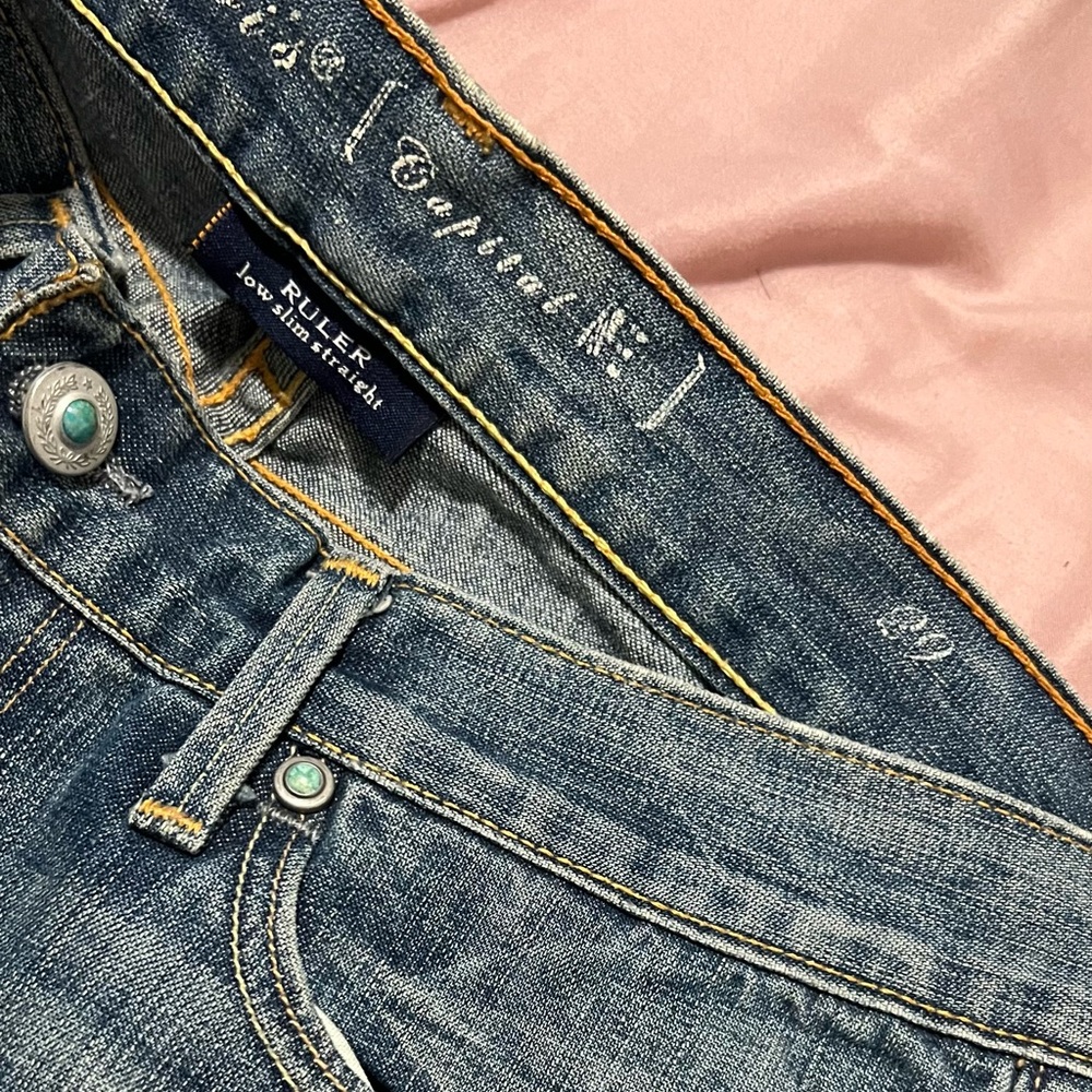 Levi's Blue Straight Leg Jeans with Classic Medium Wash and Durable Construction